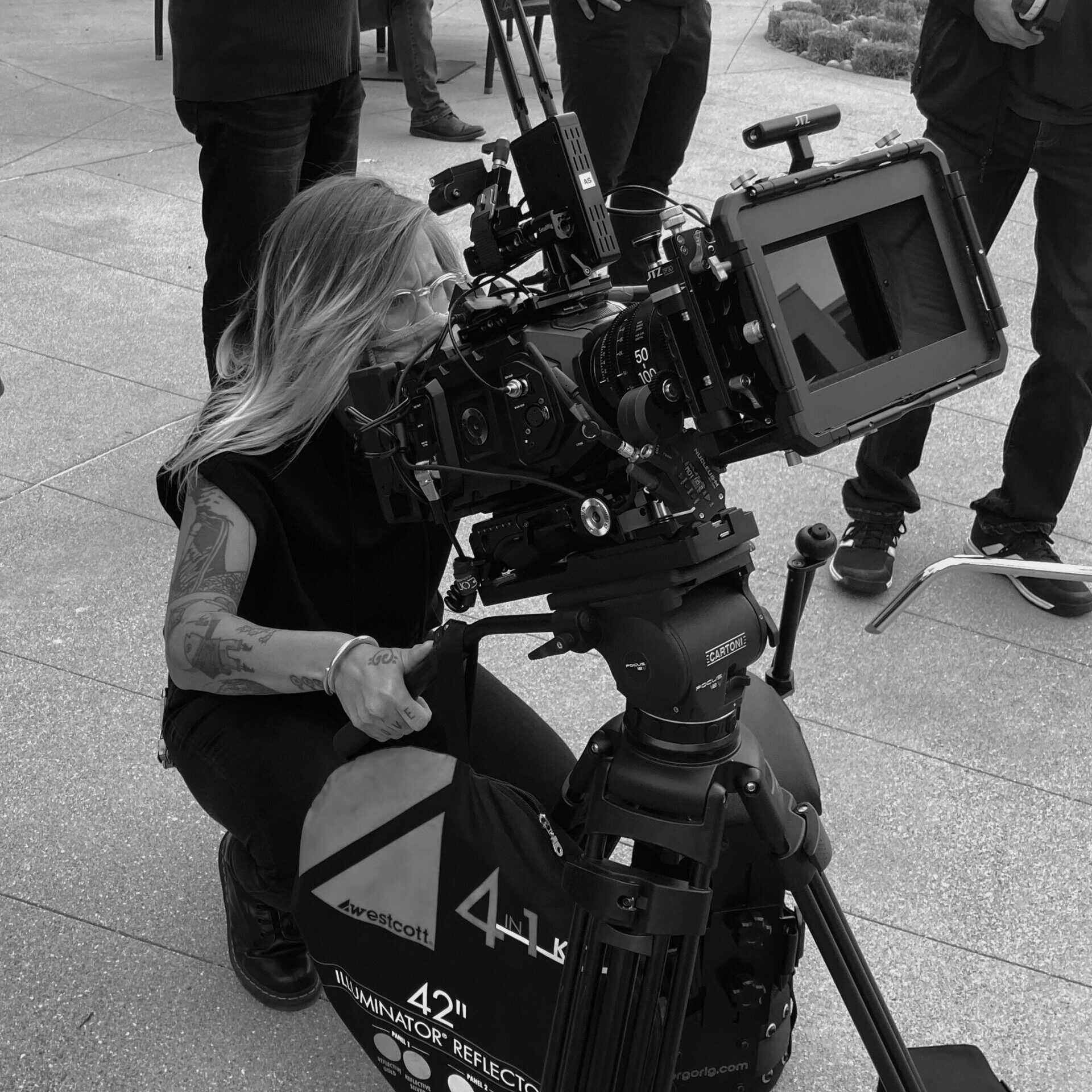 EJ McCartney - Female Director and International Photographer and Filmographer, On Set Filming a Documentary